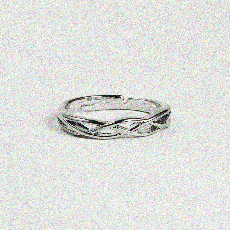 A sleek silver ring featuring a stylish curved design, perfect for adding a touch of elegance to any outfit.