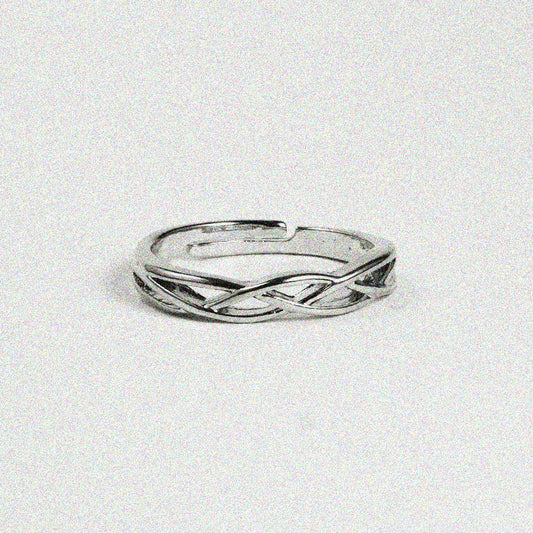 A sleek silver ring featuring a stylish curved design, perfect for adding a touch of elegance to any outfit.