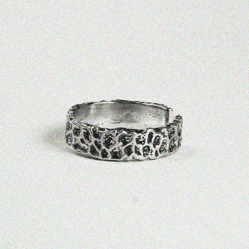 1. A silver ring featuring a delicate flower design, showcasing elegance and charm in its intricate details.

2. A beautiful silver ring adorned with a floral pattern, perfect for adding a touch of nature-inspired style.

3. A stylish silver ring with a lovely flower design, combining simplicity and beauty in one elegant piece.